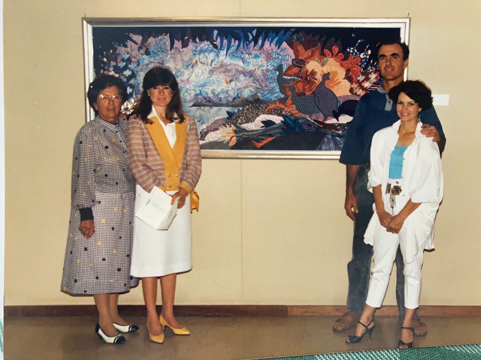 Celia de Villiers with the sculptor Kurt Lossgott, Lolli Looser and her mother in front of one of Celia's large textile collages, 1980s